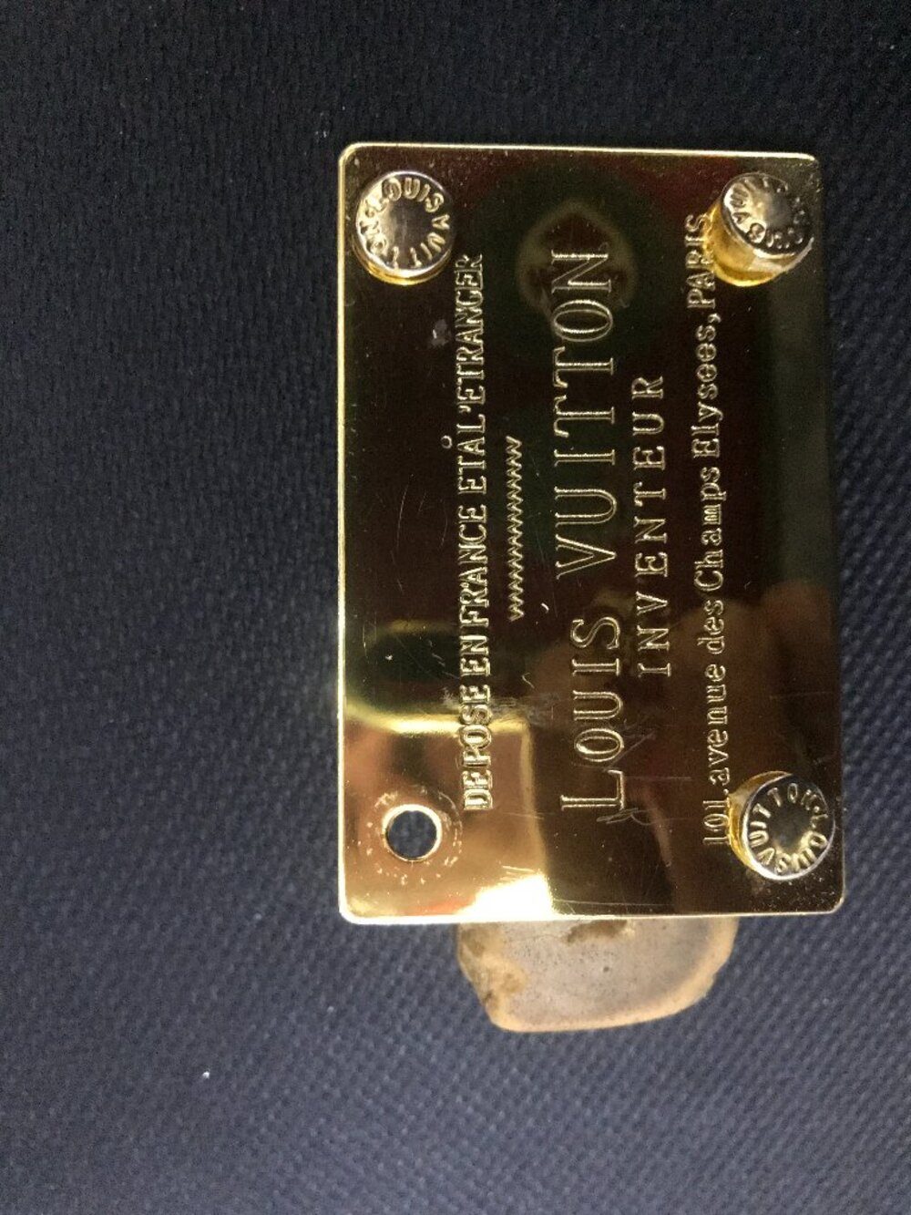 Designer brass plate from bag